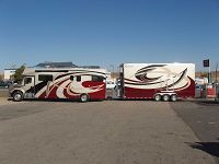 Motorhome & stacker trailer attached totaling 65'